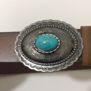 Turquoise concho buckle belt.